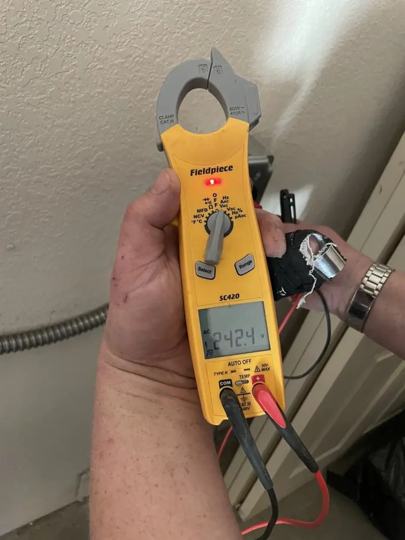 Voltage testing with clamp meter during Aluminum Wiring Replacement in Loxley